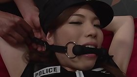 Police girl is spread in bondage and toyed to orgasm