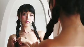 Petite asian dresses up in cosplay style and fingers her pussy